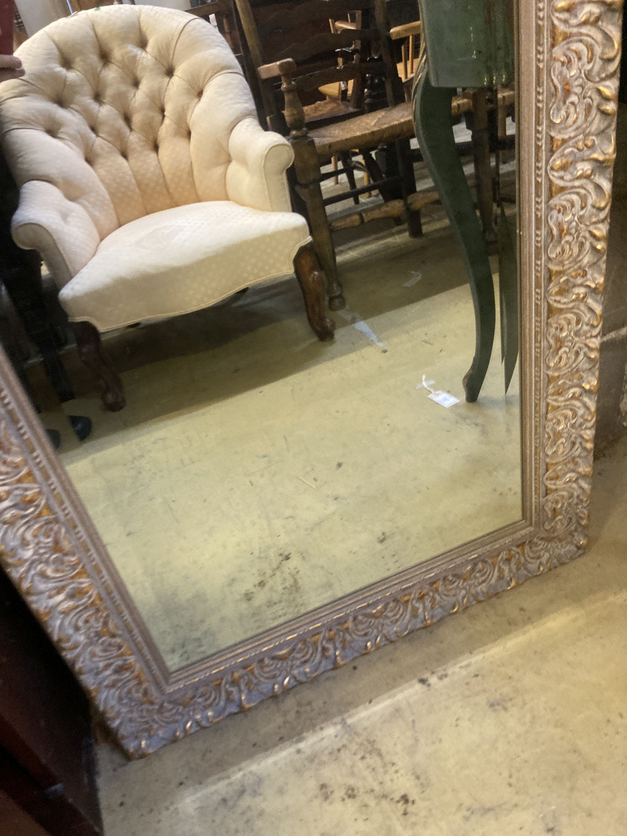 A reproduction rectangular parcel gilt wall mirror, width 70cm, height 168cm